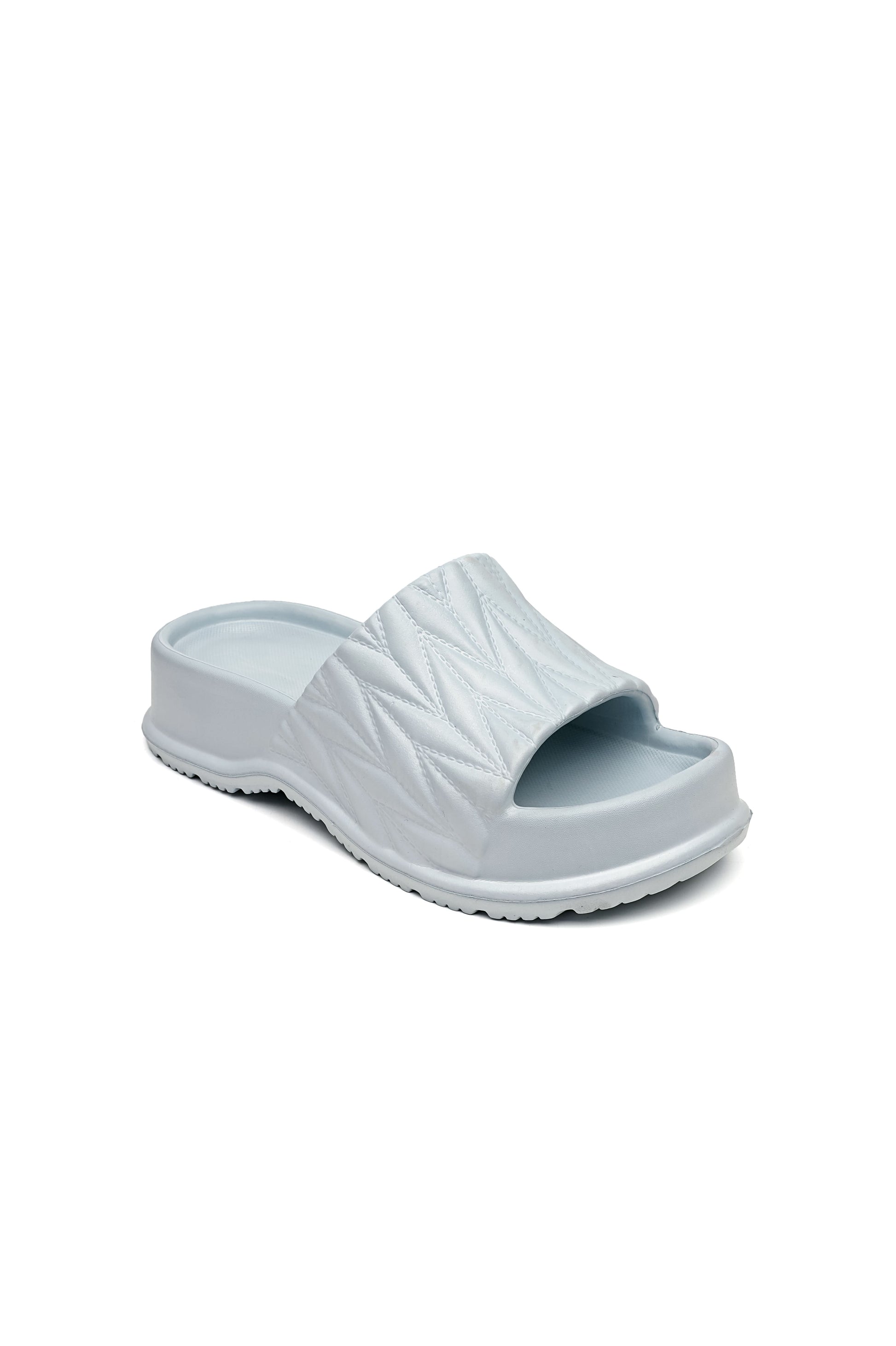 Sandalo slide ISABAC in azzurro chiaro, con fascia trapuntata testurizzata e suola spessa ammortizzata. Materiale sintetico soft-touch per un comfort superiore e presa stabile.